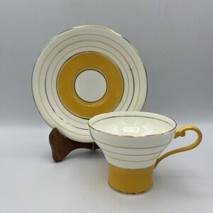 Rare Aynsley Corset Teacup and‎ Saucer Bone China England Footed MCM Orange Gold